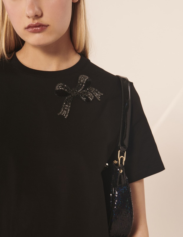 Однотонная женская футболка с аппликацией в виде бриллиантового банта