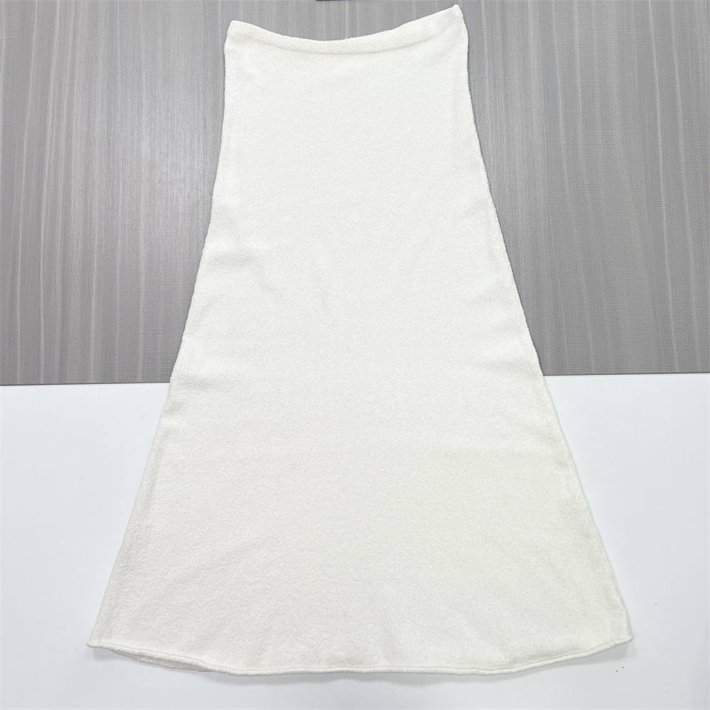 Юбка миди из текстурированного трикотажа на заказ: Завышенная талия, расклешенный крой, элегантный дизайн